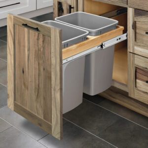 Top mount double waste container pullout drawer with dovetail construction.
